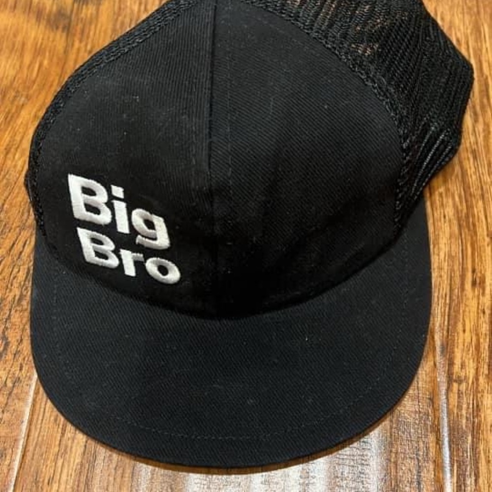 George hats “big bro”